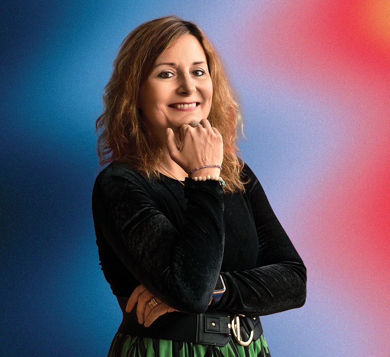 Spike the Bulldog taking a photo with people